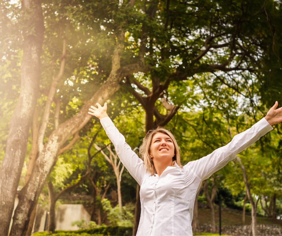 A woman taking a mindful break outdoors